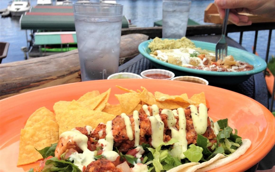 Delicious looking plate of tacos and chips from Seattle's Agua Verde Paddle Club cafe eating outdoors best Seattle summer activities families and tourists